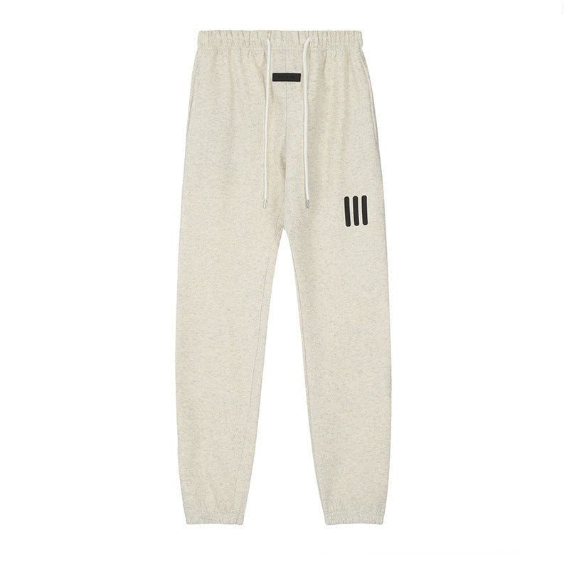 ESSENTIALS Three Stripes Sweatpants