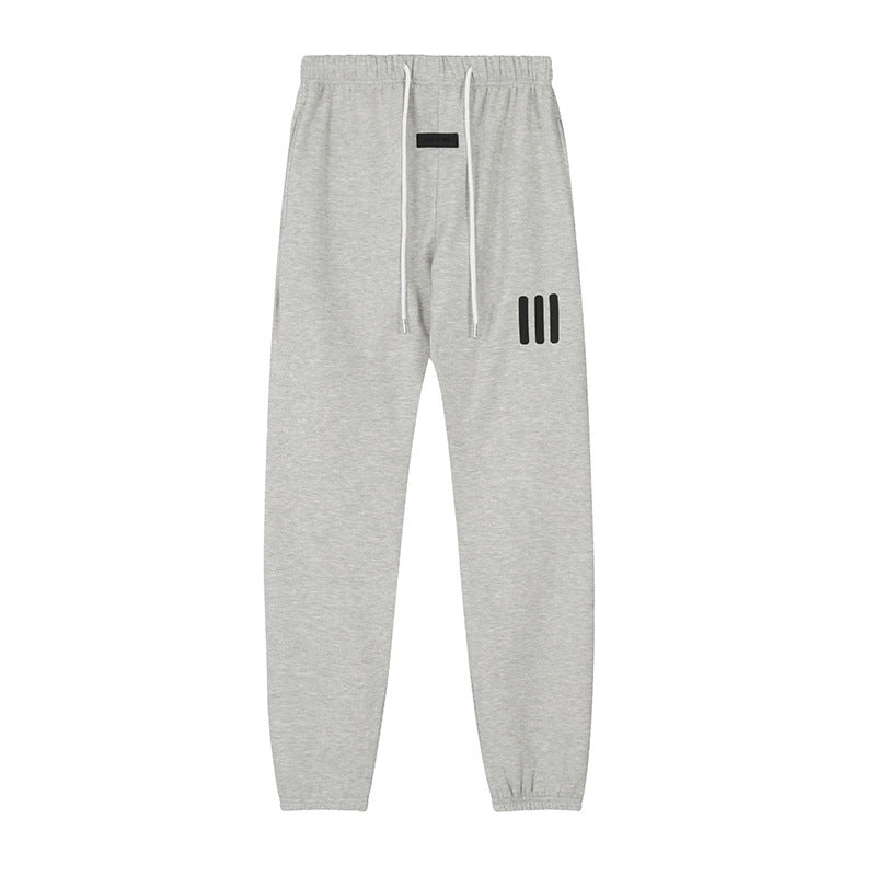 ESSENTIALS Three Stripes Sweatpants